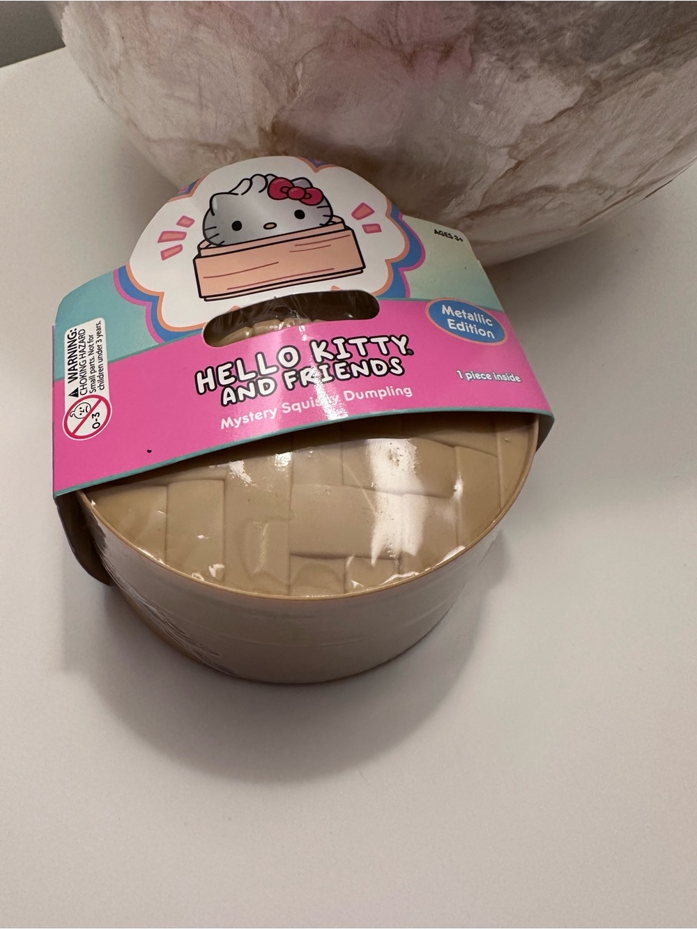 Hello Kitty Metallic Beige Mystery Squishy Dumpling